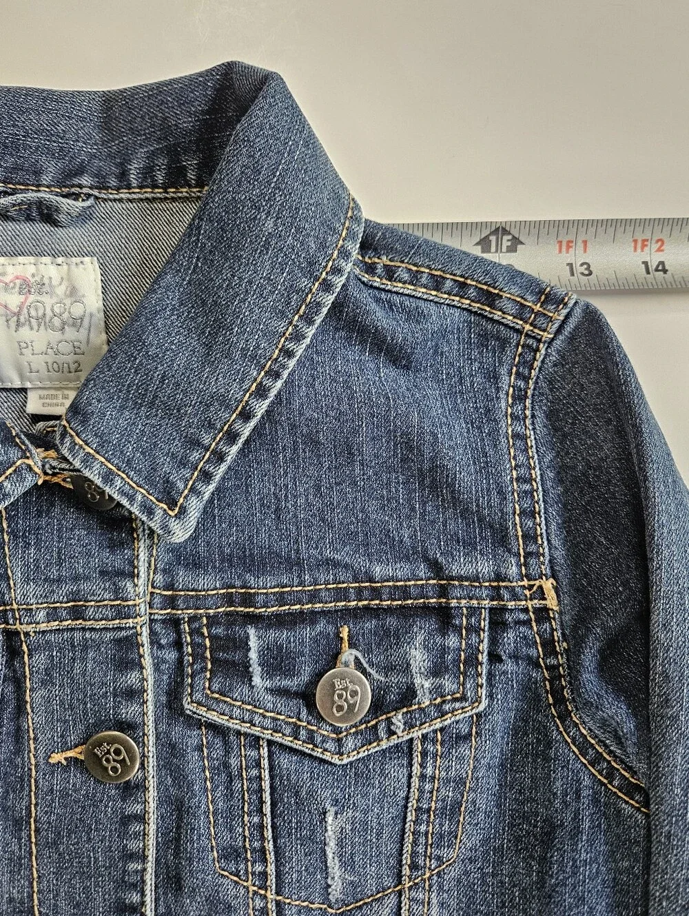 The Children's Place long sleeve distressed denim jacket